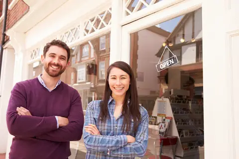 © Monkeybusinessimages | Dreamstime.com - Couple Standing In Front Of A Shop Window Photo