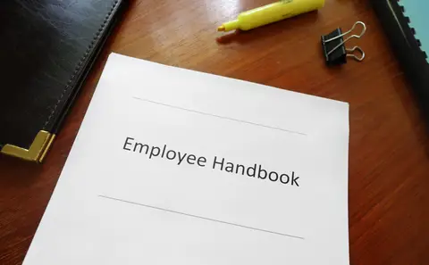 © Zimmytws | Dreamstime.com - Employee Handbook Photo